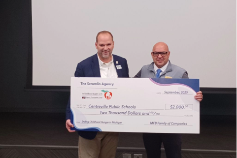 Jason presenting check